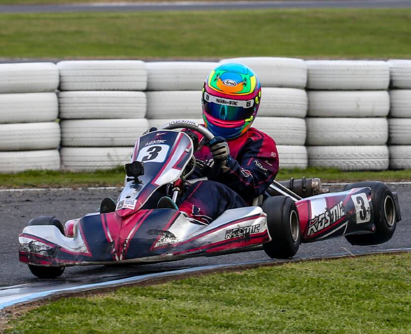 On the corner: Lewis gets some air in his kart as he goes around the tight corner. Picture: Supplied.