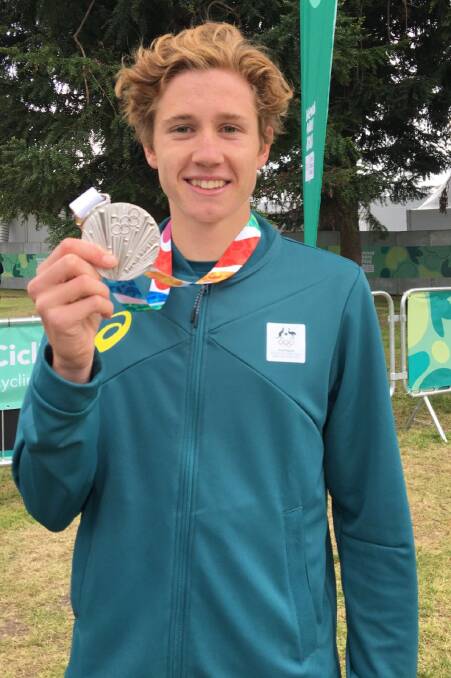Medal winner: Josh Ferris won silver in the mixed group triathlon at the 2018 Youth Olympics. Picture: Supplied
