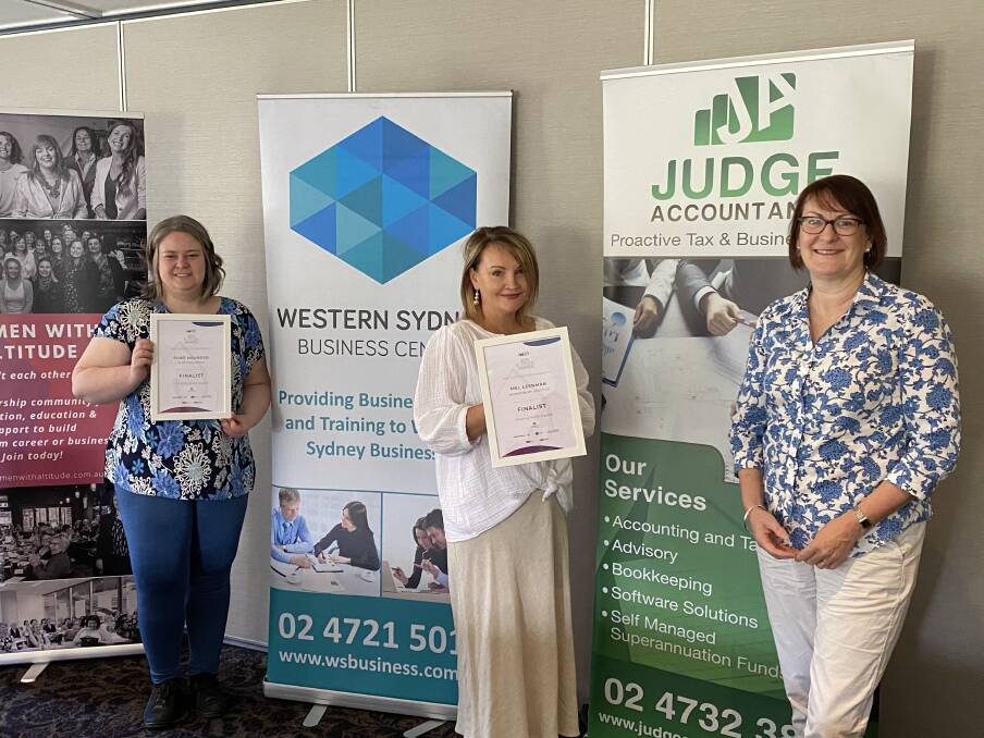Macquarie MP Susan Templeman presents Elise Maunder of Elise Lola Designs (left) and Mel Leenman of The Hawkesbury Lifestyle (middle) with their 2020 Altitude Awards finalist certificates at Windsor. Picture: Supplied.
