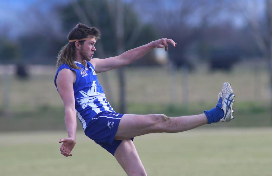 Party in the back: Hawkesbury's Michael Sieders rocking his mullet while he plays for the Norwest Jets. Picture: Geoff Jones.