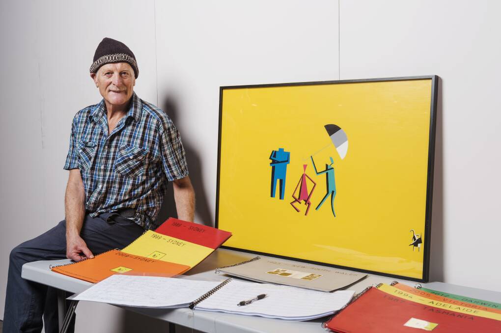 Three well known Australians: Artist Martin Shaw sat next to his original portrait, holding some of the yearbooks that are included in his touring exhibition. Picture: James Brickwood