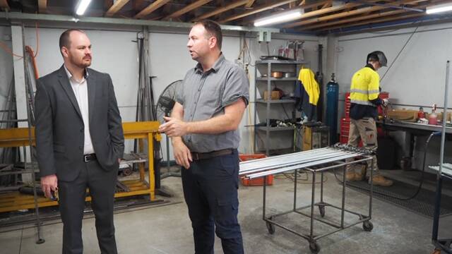 Enganged: Tusken Engineering Manager Paul Crutcher chats with Hawkesbury City Mayor Patrick Conolly at the businesses South Windsor facility. Picture: Supplied.