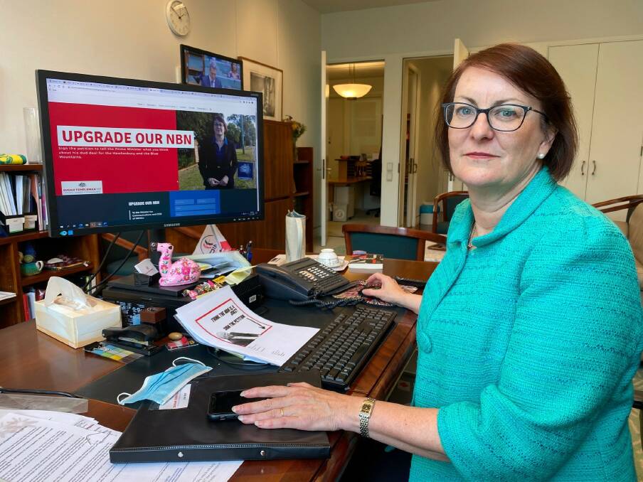 Federal Macquarie MP Susan Templeman, with the petition calling for better NBN in the Blue Mountains and Hawkesbury. Picture: Supplied.