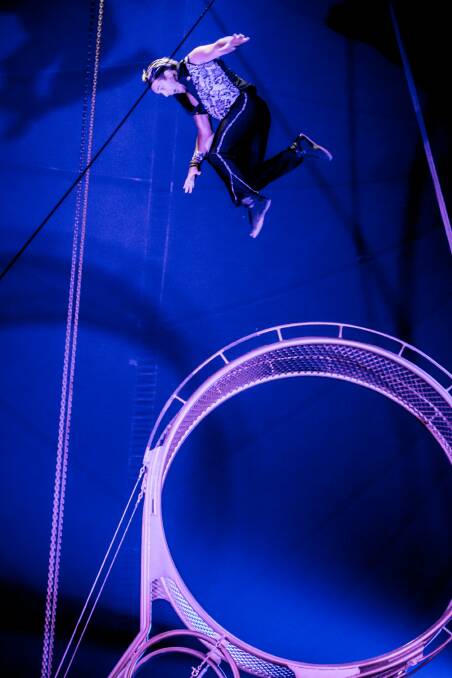 High-flying: Webers Jansen Grant flies high above the wheel of death. Picture: Supplied