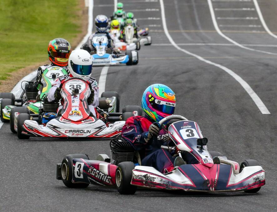 Leading the pack: Lewis leads the group in his race during a regional competition. Picture: Supplied.
