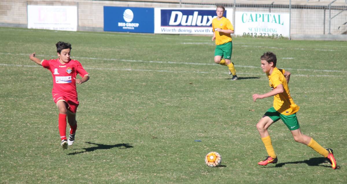 Rushing by: Riley Howarth dribbles the ball past his opposition while playing for Australian squad. Picture: supplied