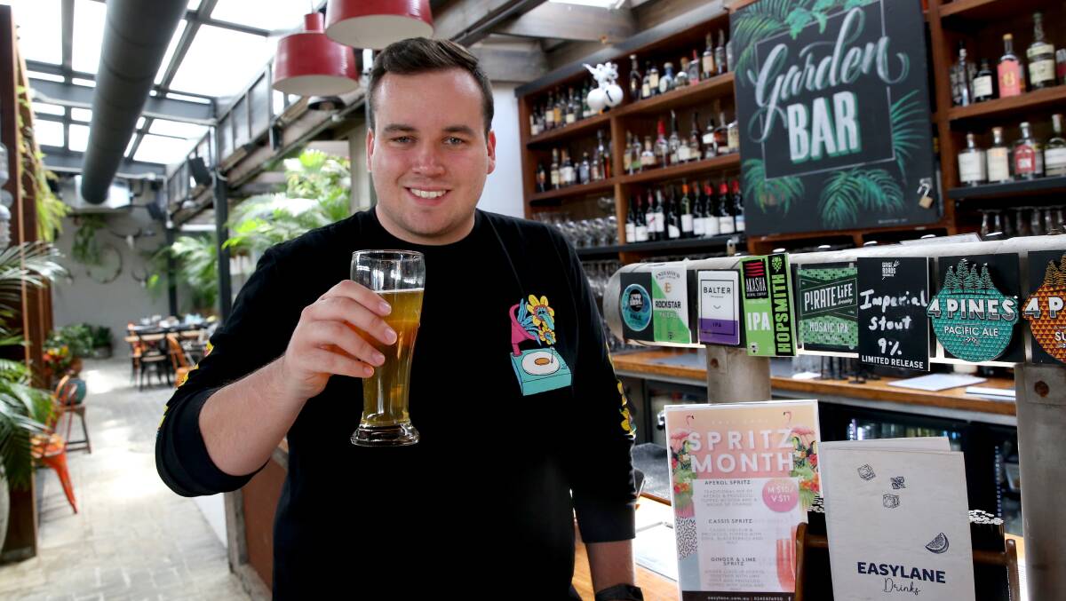 Taste test: Gazette journalist Finn Coleman at Easy Lane Kitchen and Beer Garden, where he sampled some of the venue's extensive craft beer selection. Picture: Geoff Jones.