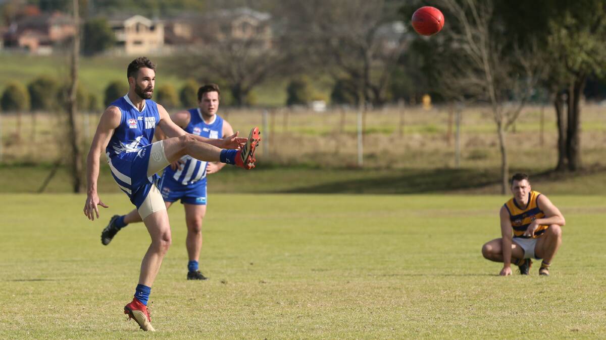 Taffy Lewis kicks a goal for the Norwest Jets in their Division 3 match against Sydney University at Bensons Lane, Richmond, in June. Picture: Geoff Jones.