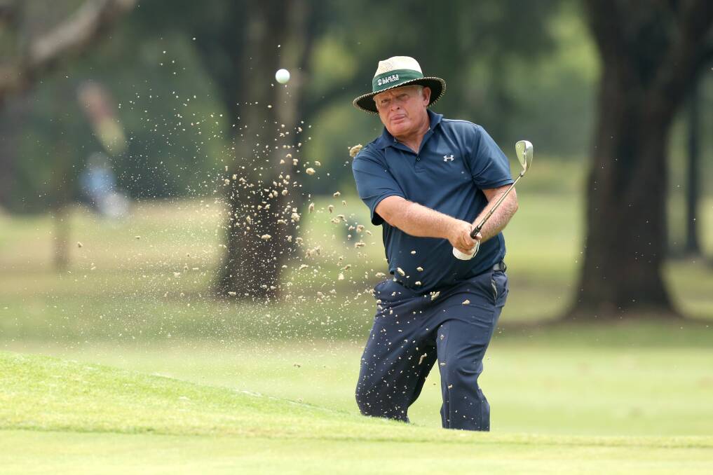 Sand trap: Peter Senior plays a shot out of a sand bunker on his way to first place and nine under par in the Australian PGA Seniors Championship at Richmond Golf Club. Picture: Geoff Jones.