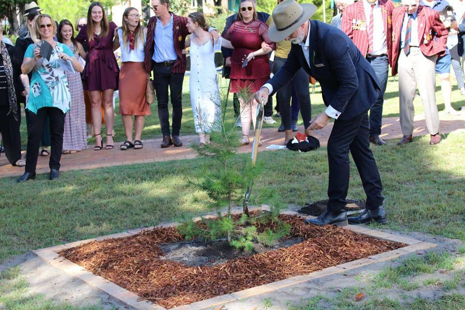 Lone pine: Mr Darren Greentree, Deputy Hawkesbury Campus Provost, WSU plants the lone pine prior to the HAC war cry led by Jarrod Lefevre. Picture: Emily Liddell