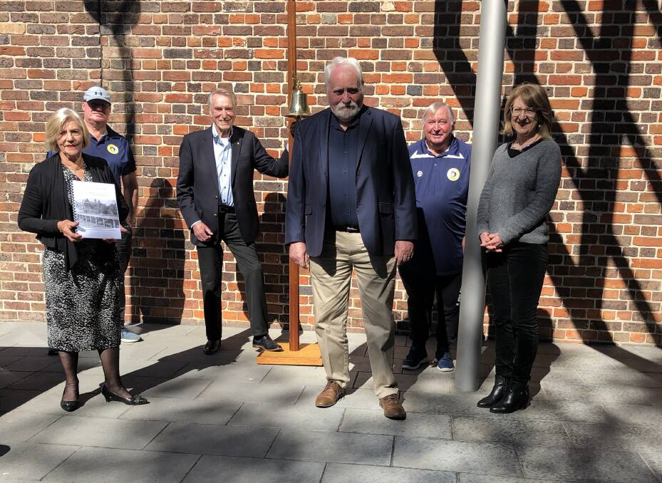 Supporter: Frank Ifield rings the bell at the Hawkesbury Regional Museum in the company of the Cr Barry Calvert, Alan and Alan from Harmony FM, and Claudia and Cheryl from Defenders of Thompson Square. Picture: Supplied.