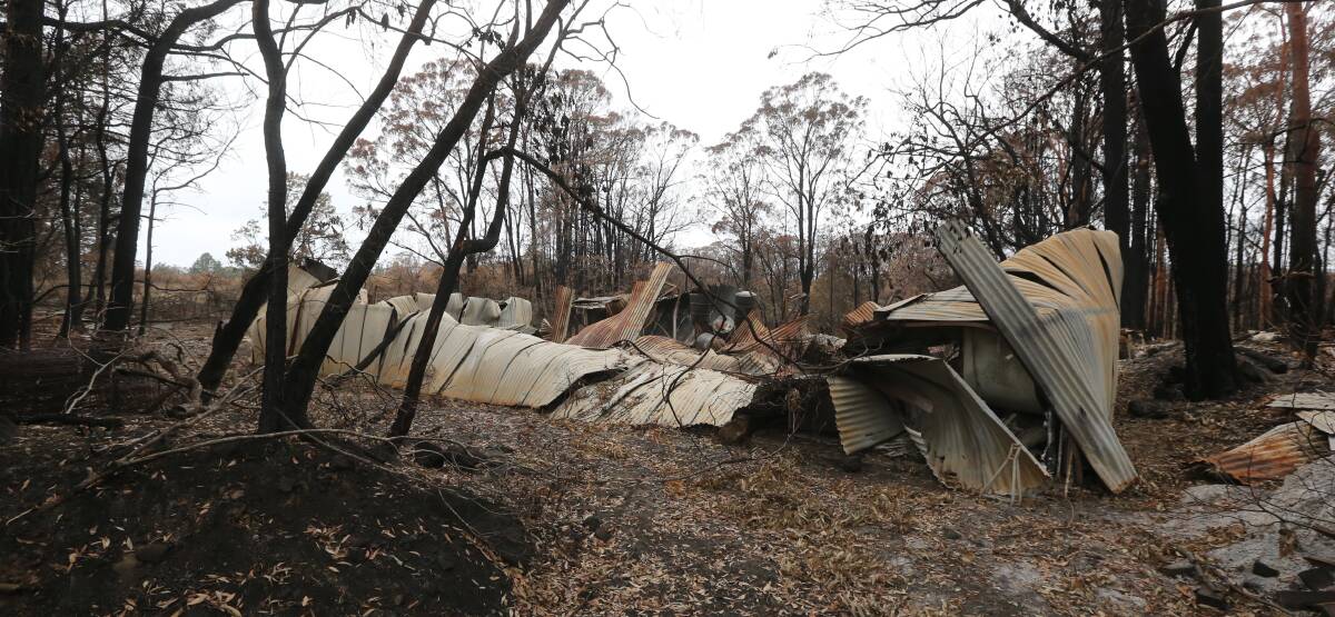 Clean-up: A property that was damaged on Pittmans Road, Bilpin during the summer bushfires. Picture: Geoff Jones. .