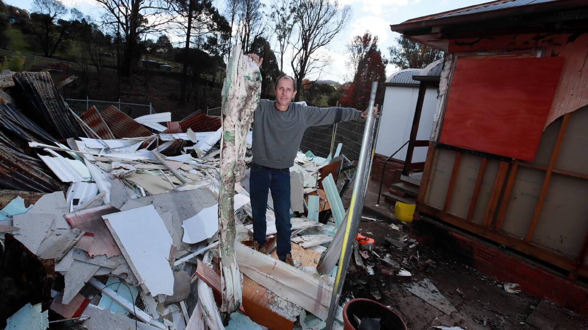 TERRIBLE LOSS: Dean Sweeney lost his home to the bushfires earlier this year. He is still in the process of repairs, and will be for some time. Picture: Les Smith