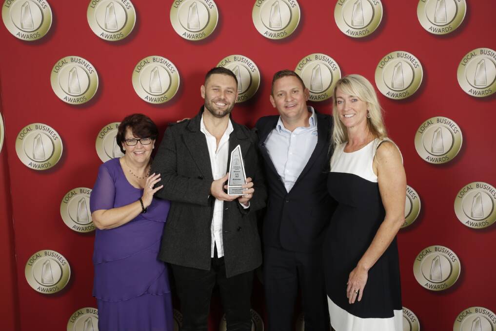  TOP SHELF: Doolan Plumbing celebrates being named Business of the Year at the awards presentation night.