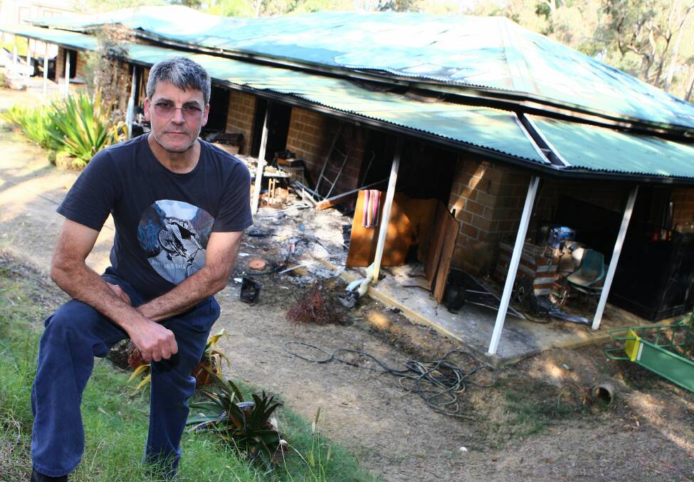 Steve Vacopoulos shortly after his house was gutted in 2014.