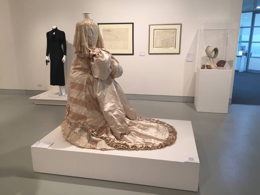 A black Quaker gown created in 1650 and altered several times over the centuries until its present incarnation in the 20s; and a spectacular American bustled gown from the 1880s.