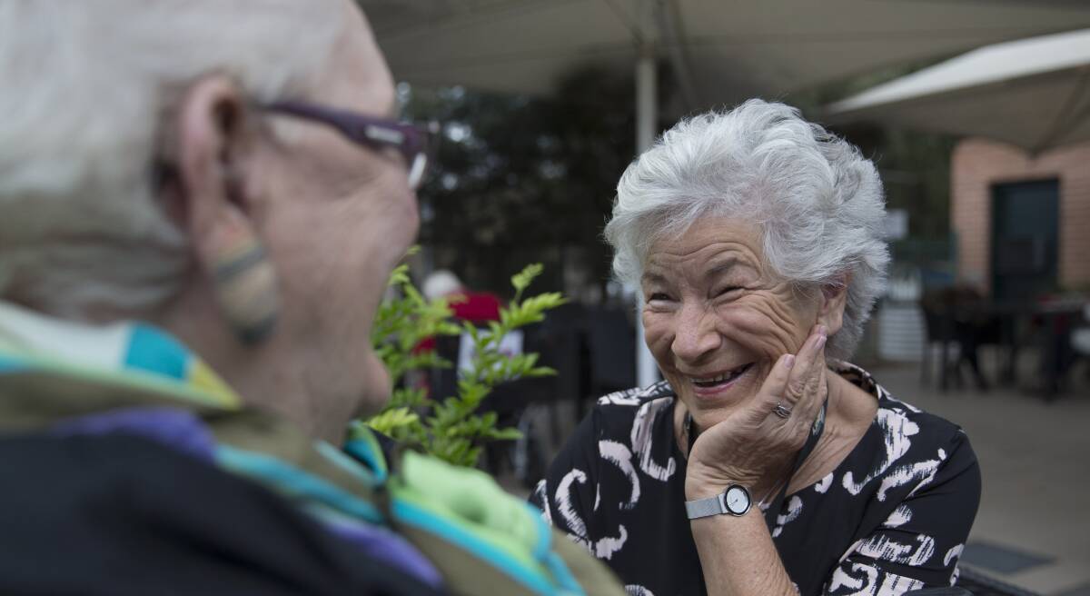 Loving it: Hawkesbury Living volunteer chaplain Barbara Carter, right, chatting with nursing home resident Marjorie Campbell. Picture: Geoff Jones