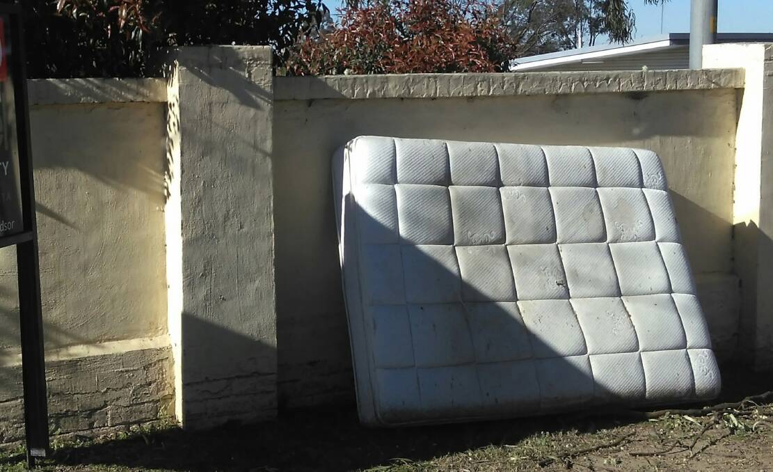 This mattress was dumped on Council land. The owner was located and was twice given a direction to remove it. They didn't, and were fined $250.