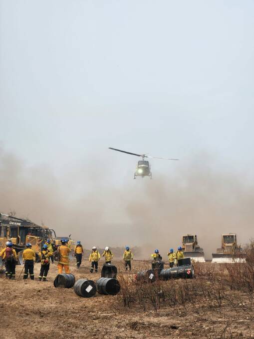 A helicopter taking off to monitor the wildfires from the base camp Paul was at, in Alberta. Picture supplied.