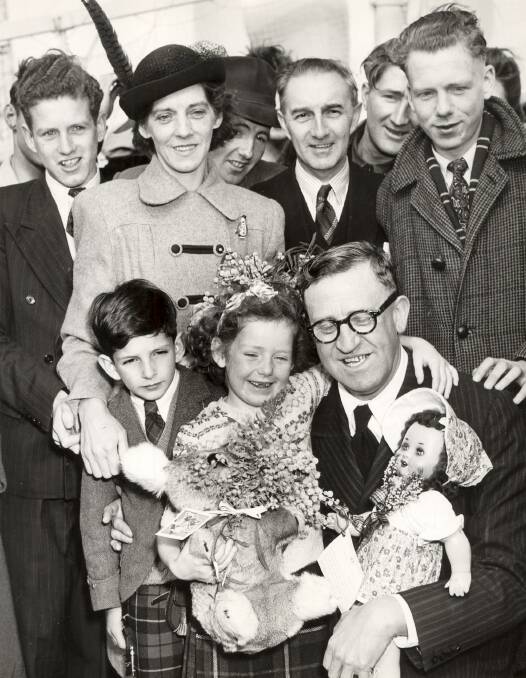 Isobel Saxelby, aged 6, was given gifts including a stuffed koala when she arrived in Australia as the 100,000th post-war British immigrant in 1949.