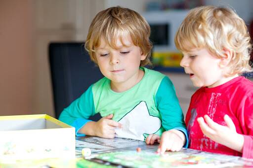 Board games are a great inexpensive way to entertain children. Photo by Shutterstock