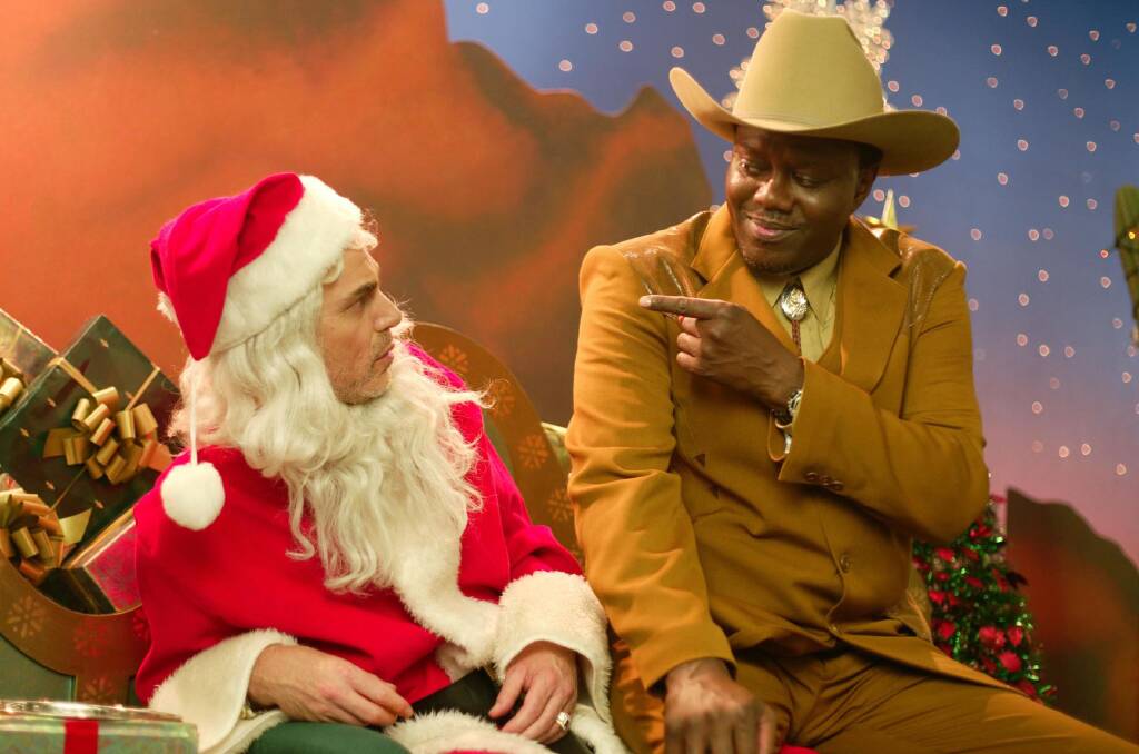 Billy Bob Thornton and Bernie Mac star in Bad Santa (2003)