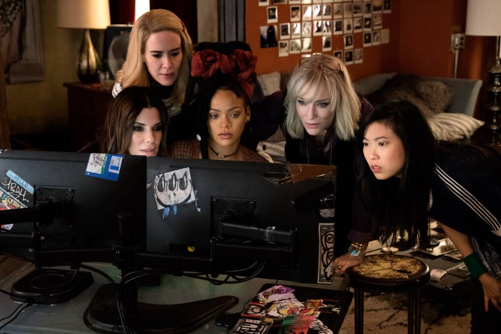 New crew: Sandra Bullock, Sarah Paulson, Rihanna, Cate Blanchett and Awkwafina play five members of the heist team in Ocean's 8, rated M, in cinemas now.