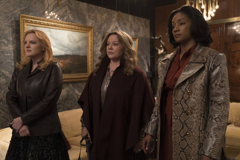 Sisters doing it for themselves: Elisabeth Moss, Melissa McCarthy and Tiffany Haddish star as Irish mobsters Claire, Kathy and Ruby in Andrea Berloff's The Kitchen. 