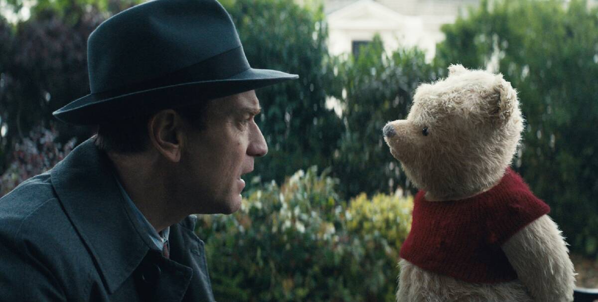 Too cute: A beautifully animated Winnie the Pooh surprises Ewan McGregor's grown-up Christopher Robin in the new film of the same name, rated G, in cinemas now.