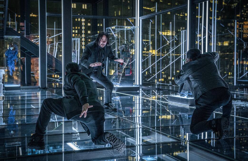 Face off: John Wick (Keanu Reeves) goes up against two highly-skilled fighters in one of the more spectacular sequences of John Wick Chapter 3: Parabellum, rated MA15+, in cinemas now.