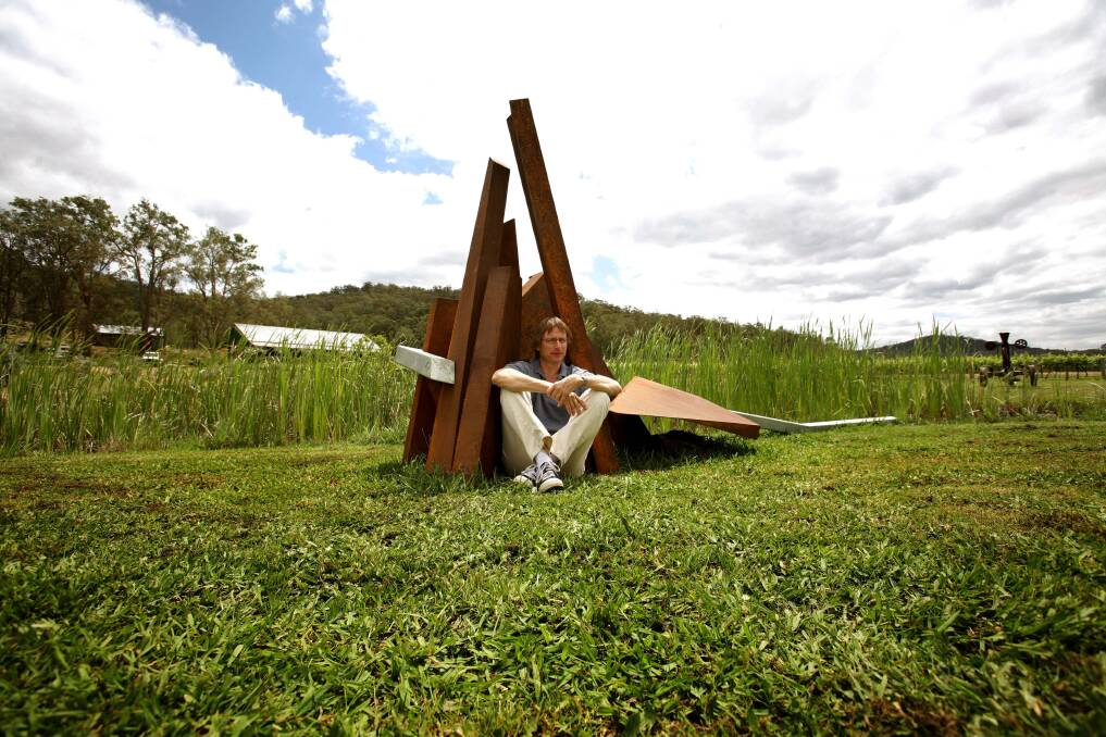 Jacek Wankowski with his work Reef as part of the Sculpture in the Vineyard exhibition in 2007. Pic Stefan Moore
