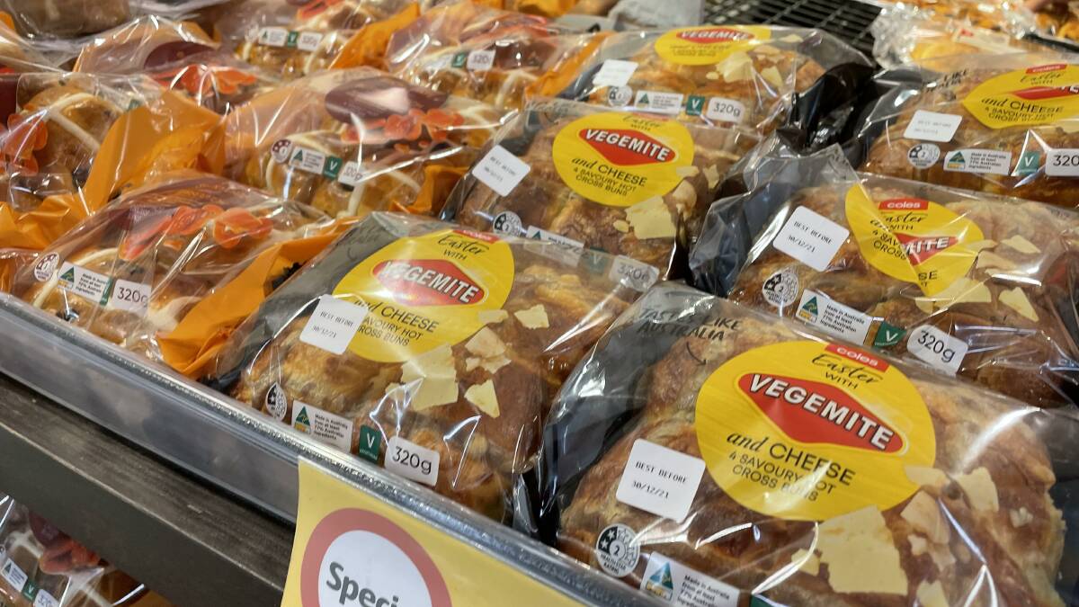 Coles has released cheese and Vegemite hot cross buns just days after Christmas. Picture: Sitthixay Ditthavong