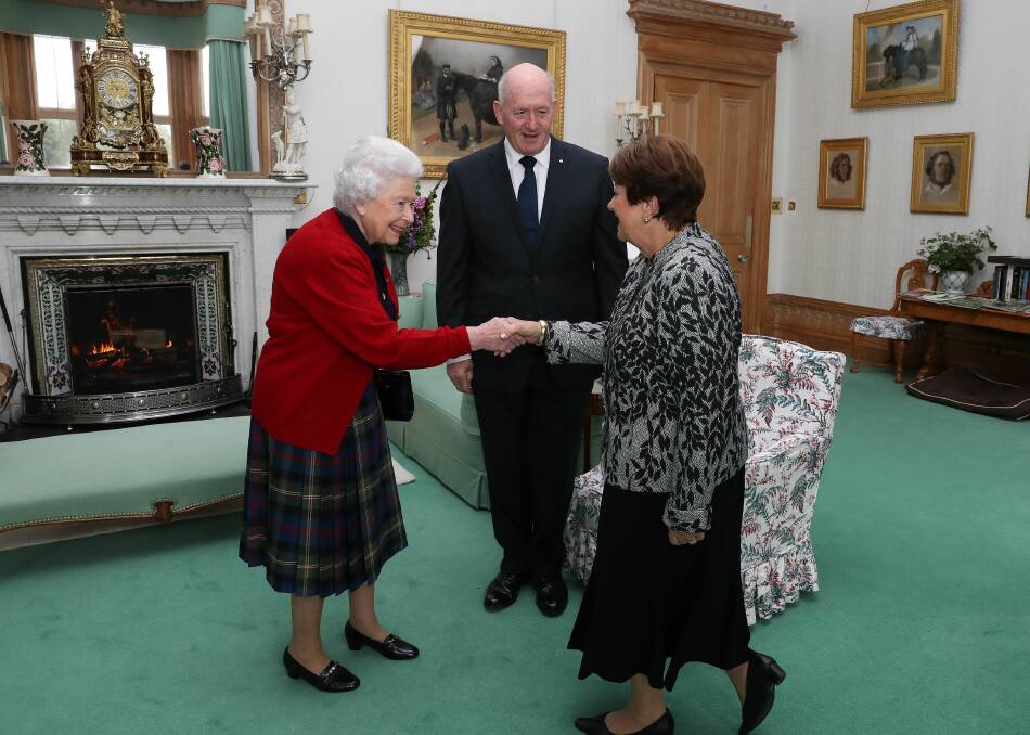 Her majesty Queen Elizabeth receives the Cosgroves at Balmoral Castle in August 2014. Picture: Supplied