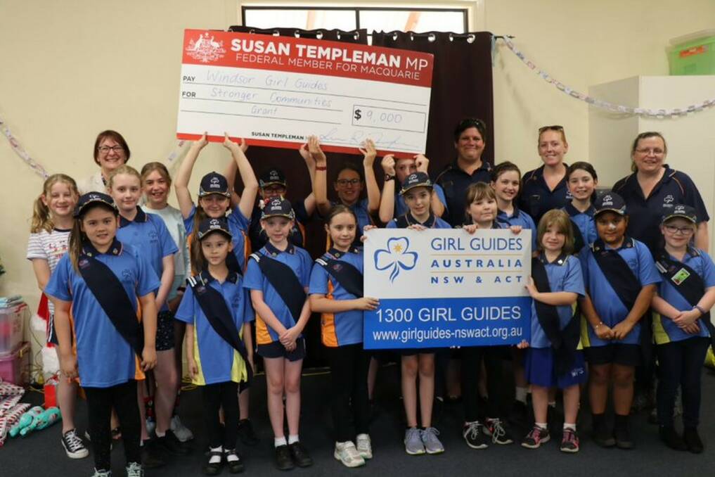 Federal Member for Macquarie, Susan Templeman, with members of Windsor Girl Guides, who got $9,000 for roofing and insulation. Picture: Supplied