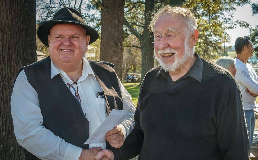 Heritage donation: President of The Friends of the Australiana Pioneer Village Inc, Kevin Weeks (left), and President of CAWB, Harry Terry. Picture: Supplied