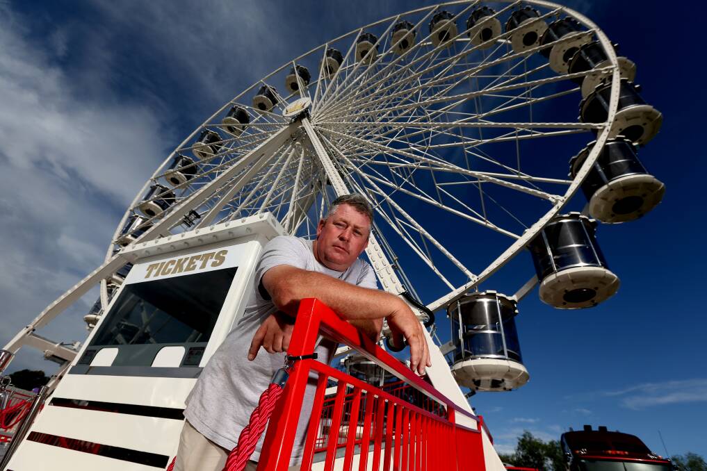 Get set: Chippa Chant of Chants Amusements with his 35-metre-high ferris wheel which is sure to be a star at this weekend's Hawkesbury Show. Picture: Geoff Jones