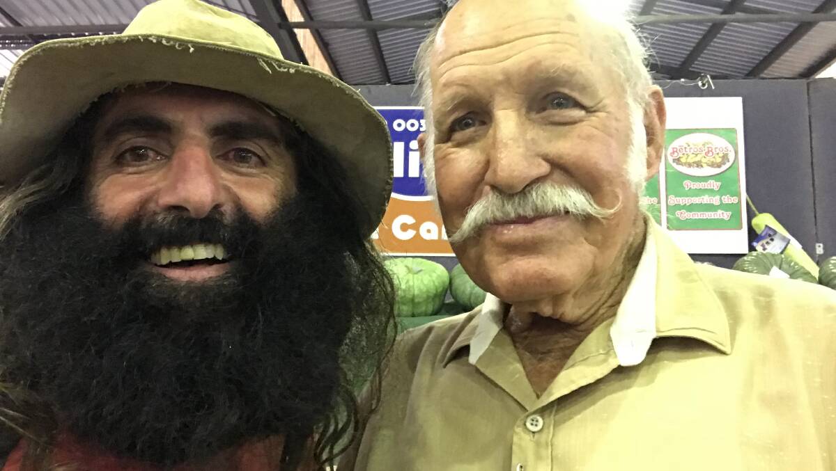 Costa at the Toowoomba Show last week with 80-year-old Charlie who won 45 prizes in the homegrown display. Picture: Supplied
