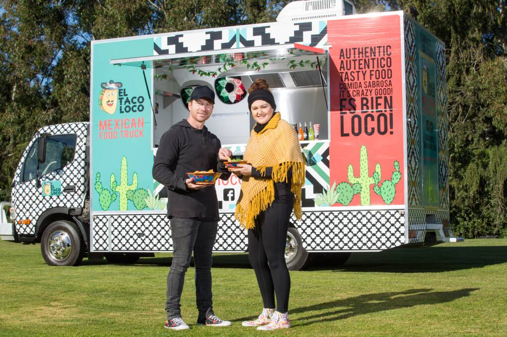 VIVA LA MEXICO: Jen and Colin Merritt, with Julio the food truck. They hope to drum-up enough business to make it a full-time venture.
