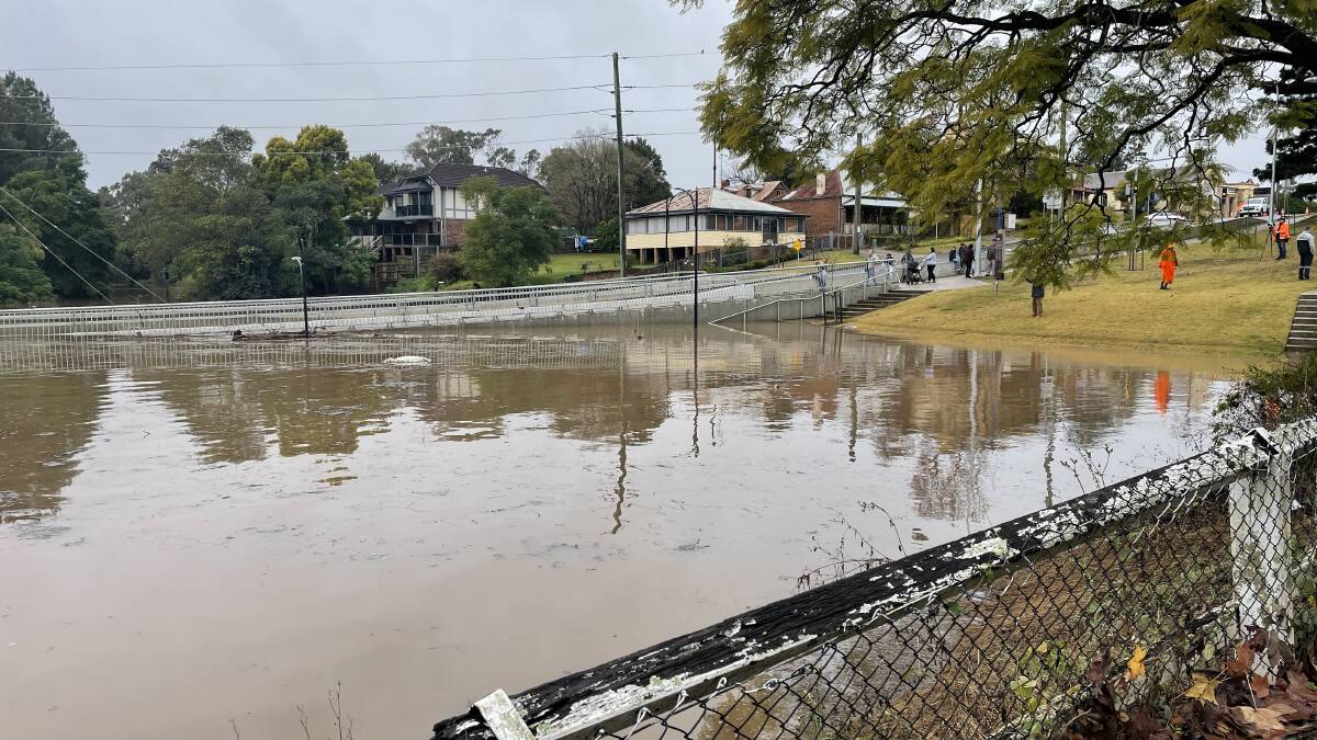 Flood waters along Windsor Bridge and Thompson Square, Windsor, during the July 2022 flood, which reached 13.93 metres at Windsor, making it the worst Hawkesbury flood since 1978. Picture: Finn Coleman.