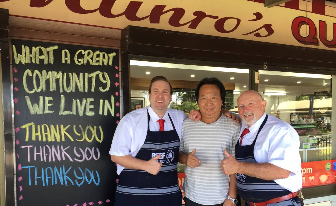 Community spirit: Craig Munro, Chong Lao, and Barry Munro outside Munro's Quality Meats in the Wilberforce Shopping Centre. Picture: Sarah Falson