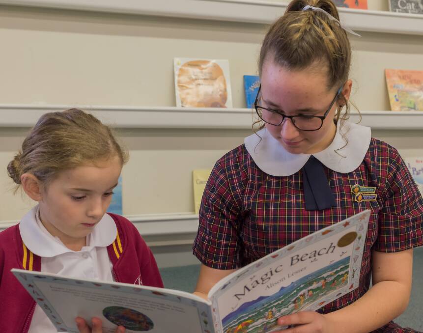 Riverstone Public School students Evie Zarka and Hayley Sawtell share a love of books.