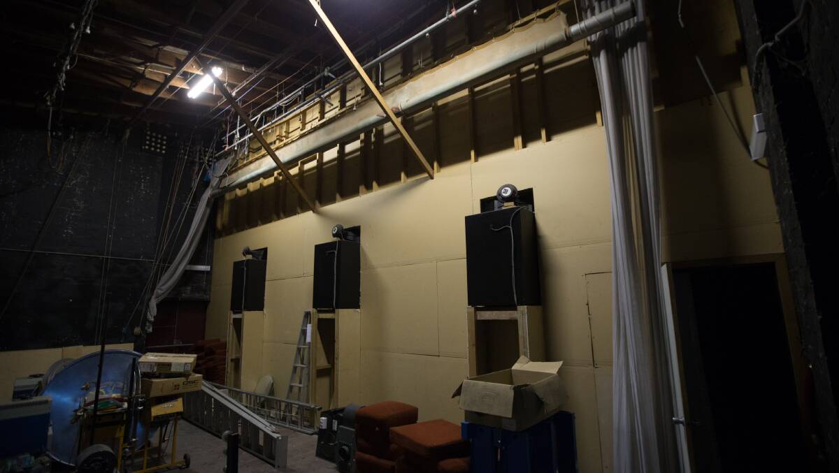 BRAVO: Old curtains and rigging still adorn the original stage area behind the screen in the downstairs cinema. Picture: Geoff Jones