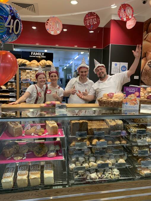 Time to celebrate: Staff at Bakers Delight Richmond Marketplace celebrate 40 years of the Bakers Delight franchise name in Australia. Picture: Supplied
