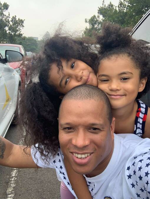 Happier times: Richard Ortega with his daughters, with whom he will be reunited after trying to get back into the country for five months. Picture: Supplied