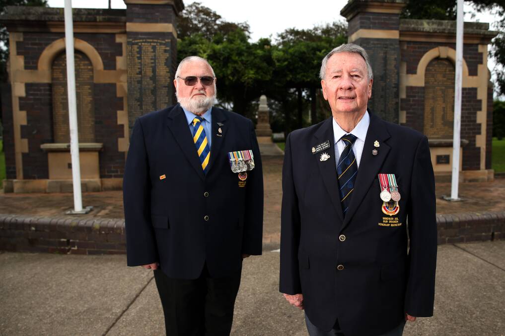 Paying respects: Windsor RSL Sub Branch President Geoff Brand and Honorary Secretary Leon Walker at the Windsor War Memorial. Picture: Geoff Jones