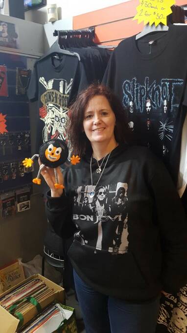 New direction: Catherine Stannard, co-owner of Richmond Records, with 'Reggie', the store's mascot, designed and made by local artist Kate Sagovac. Picture: Supplied