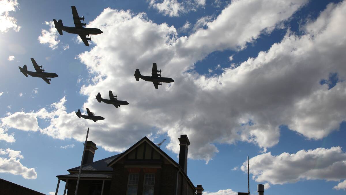 A C-130J Hercules formation flies over Richmond during training on Thursday, July 12. Pictures: Geoff Jones
