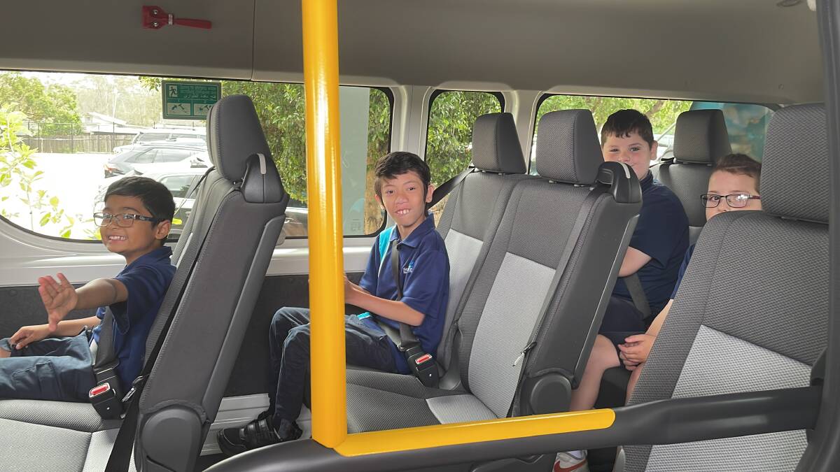 South Creek School pupils in the new modified, 12-seater bus donated to the school by Lions Clubs of Richmond and Riverstone. Picture by Sarah Falson