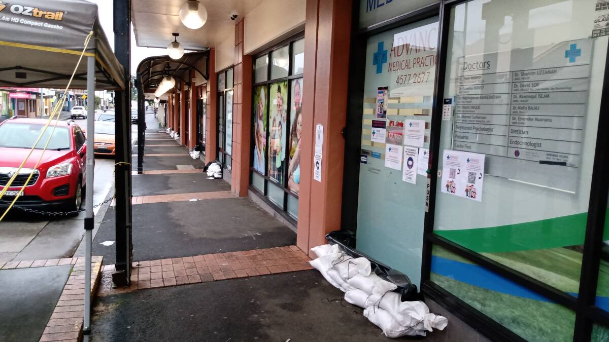 Businesses sandbagged their shopfronts down George Street, Windsor, on March 8. Picture: Sarah Falson