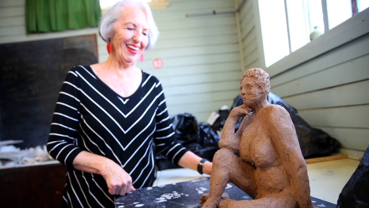 Member of the Hawkesbury Community Arts Workshop Patricia Devine with some of her work. Picture: Geoff Jones